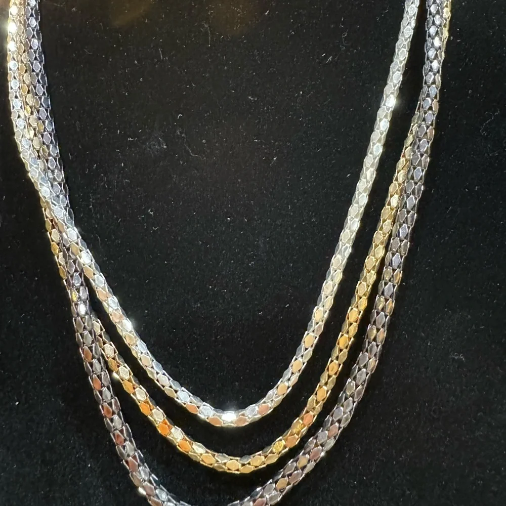 Necklace 3 Strand looks like Gold Silver Platinum. 16 to 20 in adjustabl…